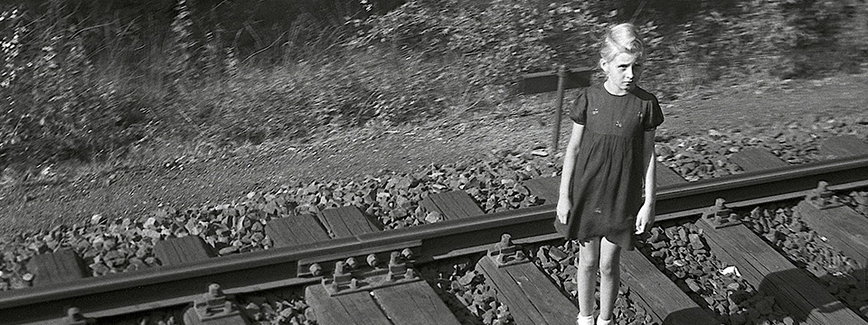 De man met de glimlach